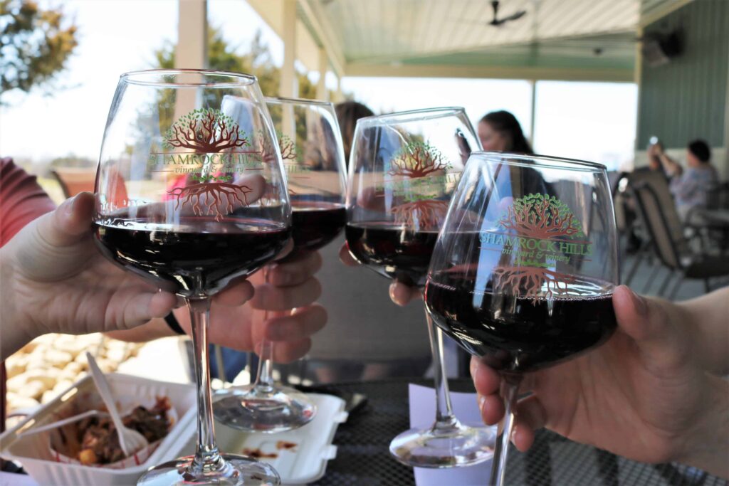 Shamrock Hills Vineyard and Winery wine glasses clinking together